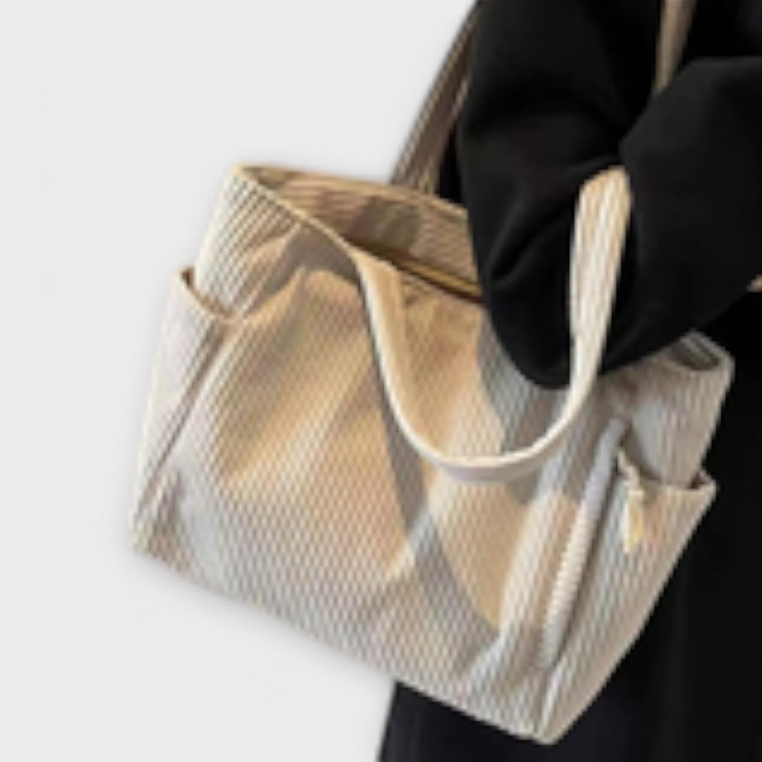 Aurora.- Schultertasche