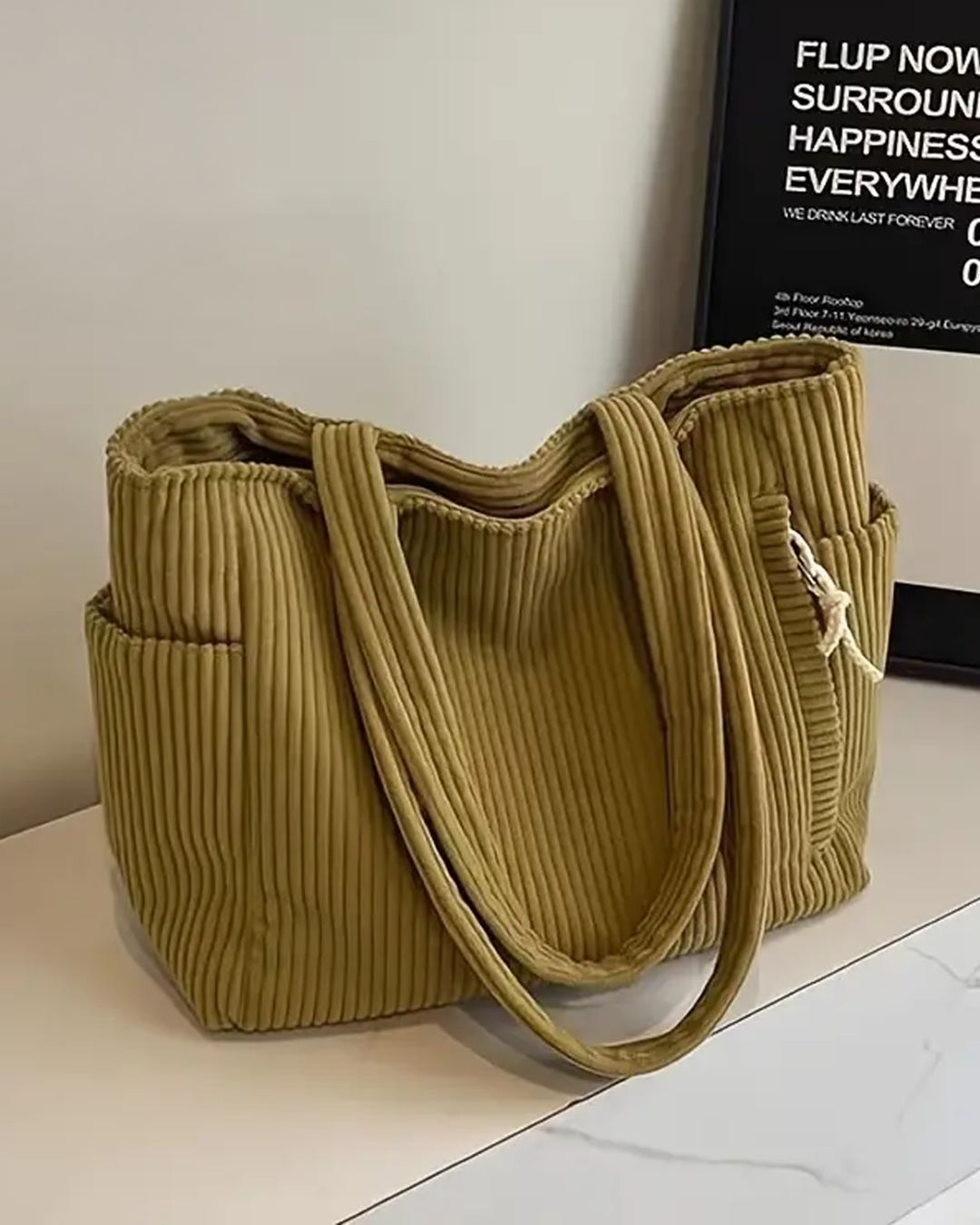 Liva™ | Gerippte Schultertasche mit Kordeldetail