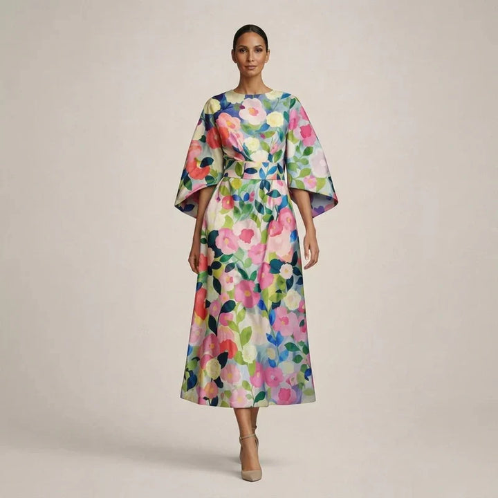 CLEMENTINE | Florales Midi mit sculptierter Taille und luftiger Eleganz