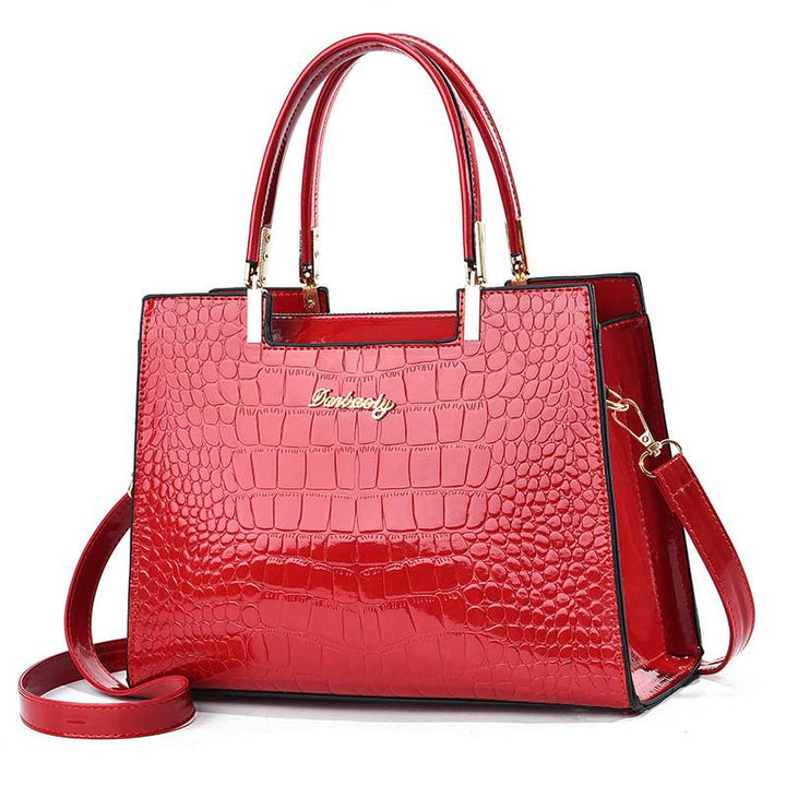 Aurora. -  Glänzende Krokodilledermuster-Handtasche